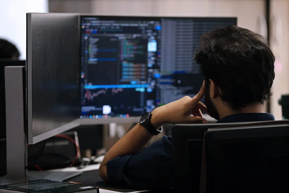 Investment Researcher at a trading terminal
